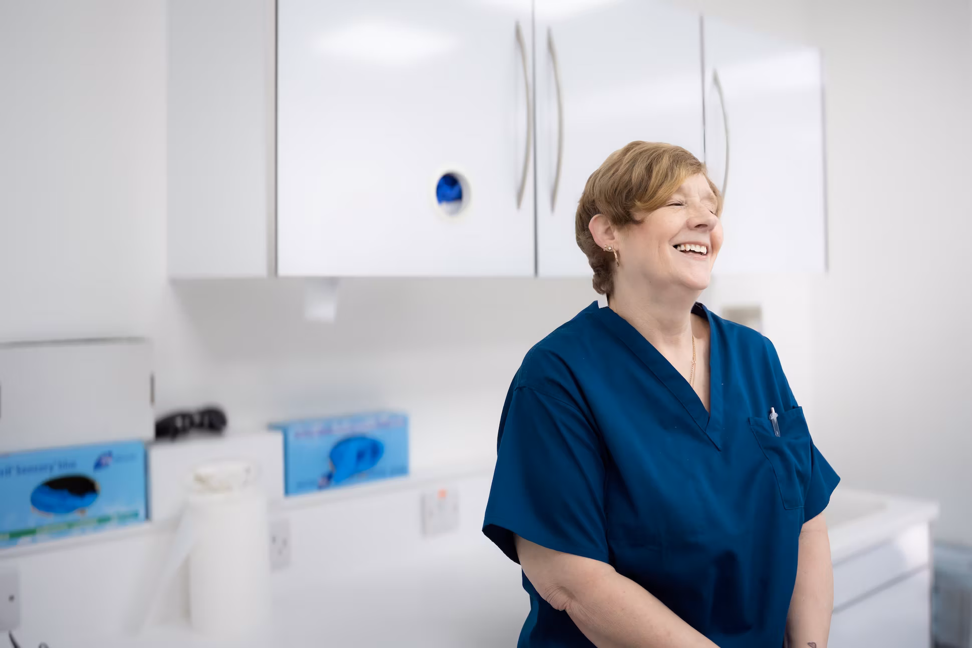 Team member laughing.