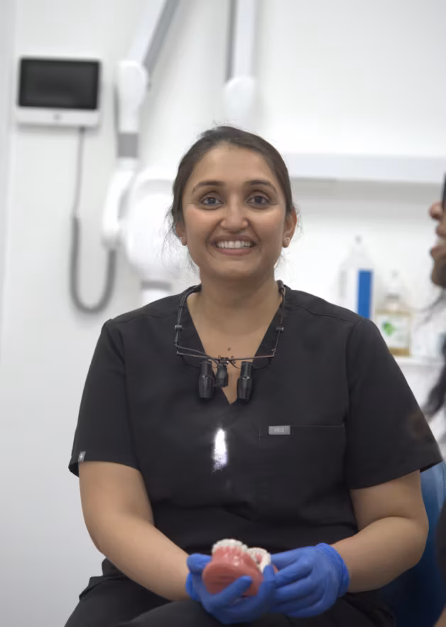 Dr Jigna Joshi smiling in a professional portrait.